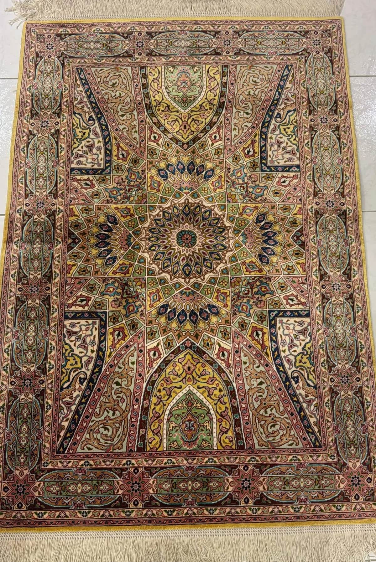 Hand-knotted Tabriz pure silk carpet on the showroom floor