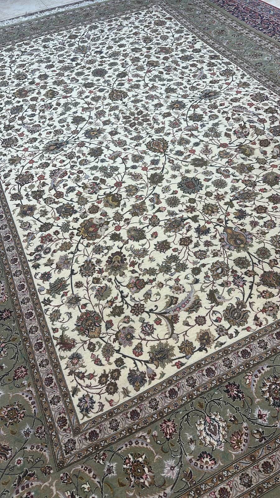 Hand-knotted Qum wool & silk carpet, 3.60 × 2.46 m, on the Al Malakia showroom floor